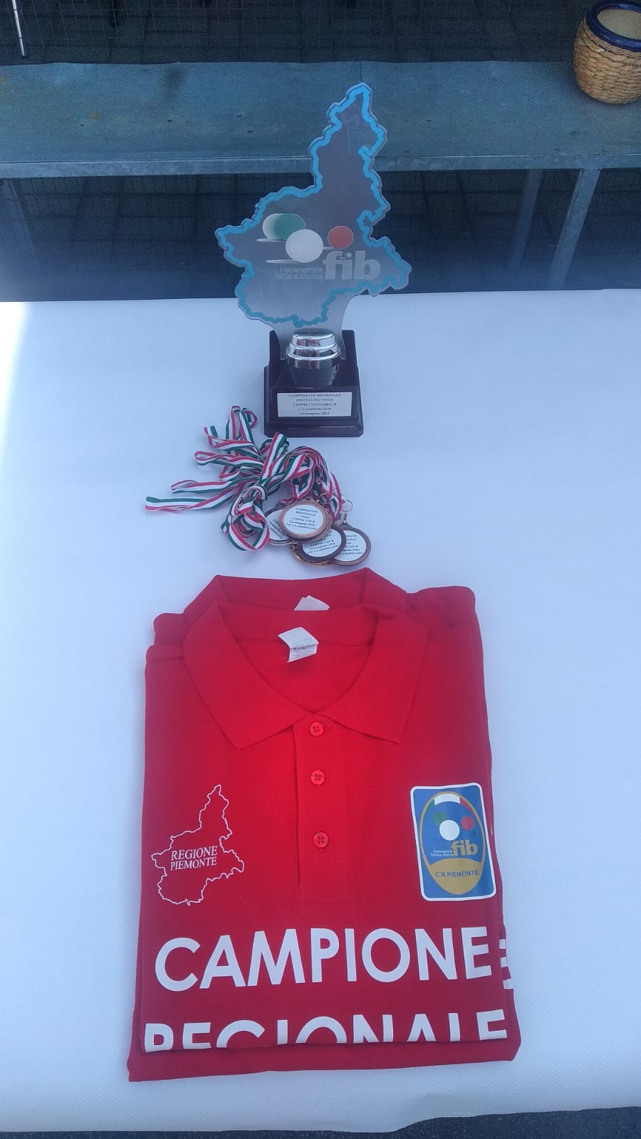Maglia e trofeo